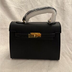 Elegant Black Satchel with Gold Hardware